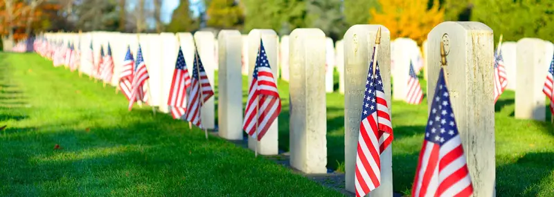 Gravestone with an American flag